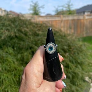 Gorgeous London Blue Topaz, Diamond and Zircon halo ring